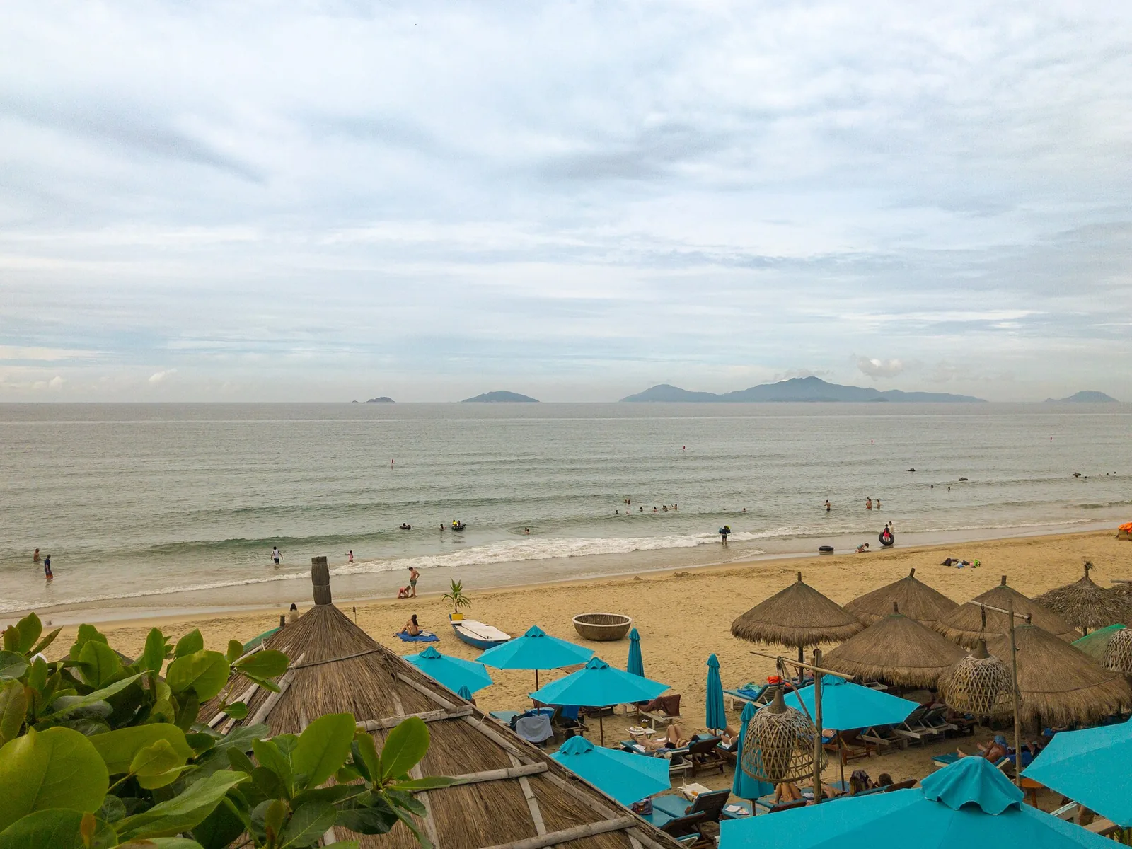 The white sand and casuarina trees of An Bang Beach near Hoi An with beach bars The white sand and casuarina trees of An Bang Beach near Hoi An with beach bars
