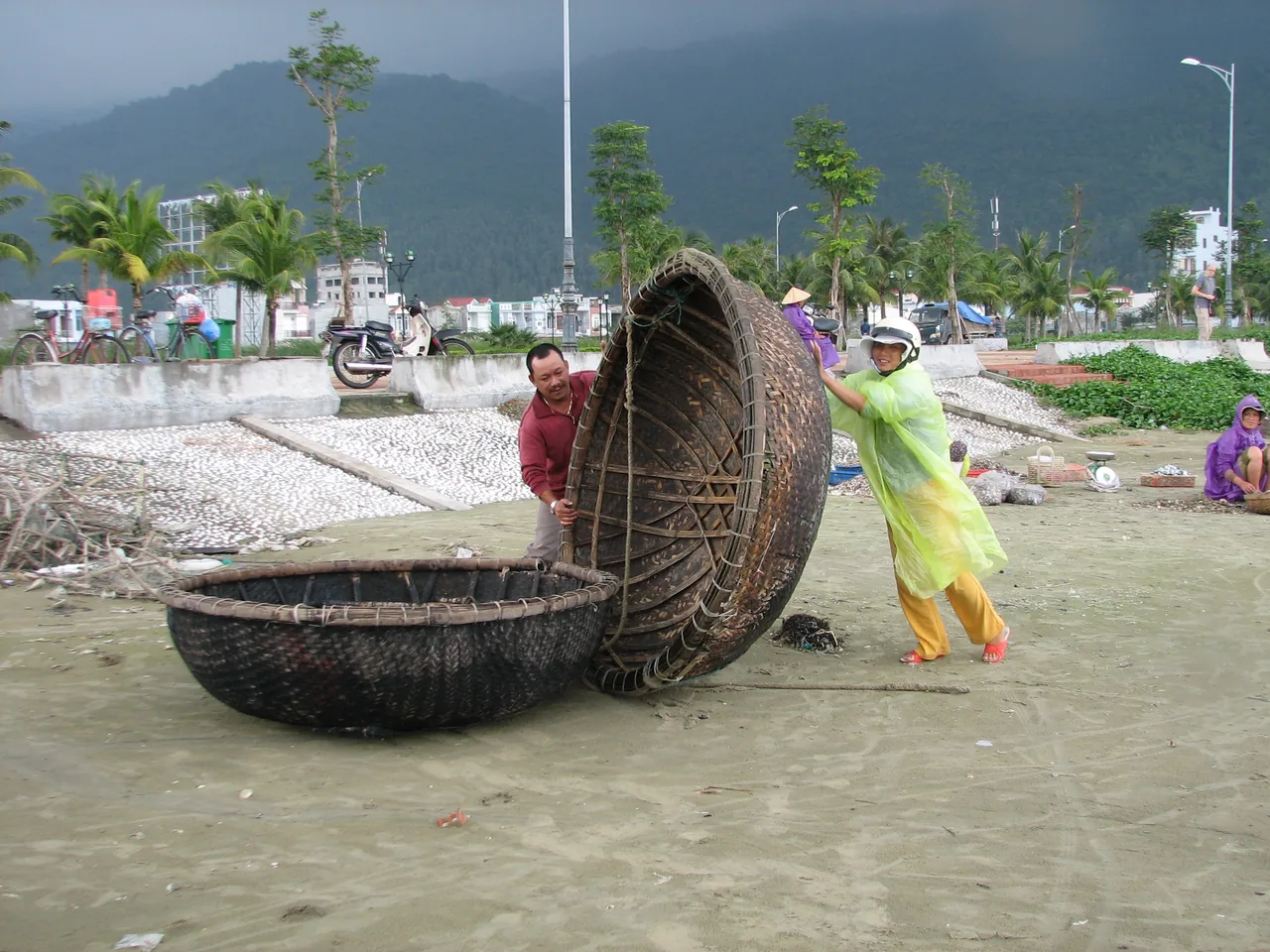 Traditional round bamboo coracle boats on a sunny Da Nang beach Traditional round bamboo coracle boats on a sunny Da Nang beach