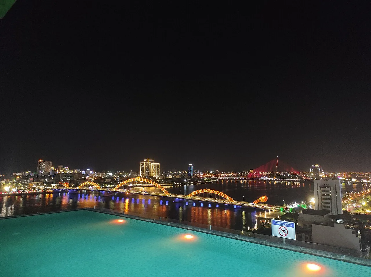 The Dragon Bridge lit up over the Han River at night
