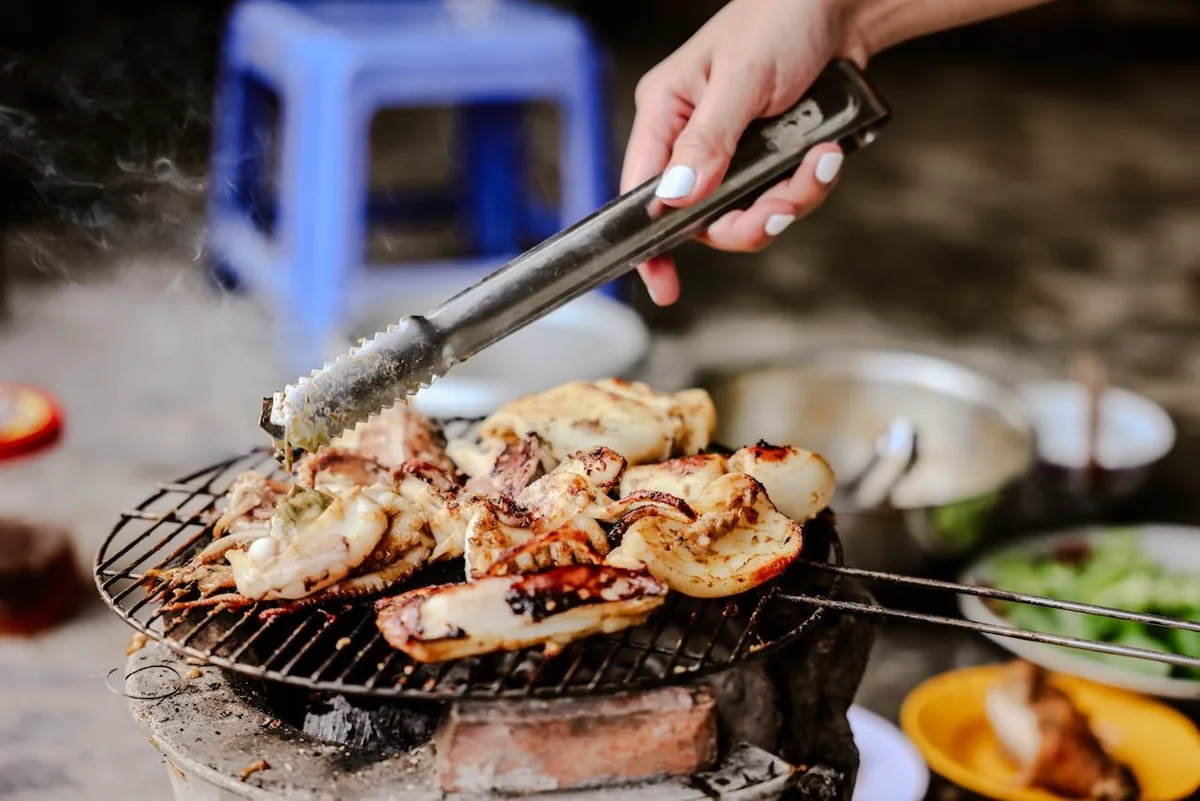 Freshly grilled squid and seafood at a Da Nang beachside eatery