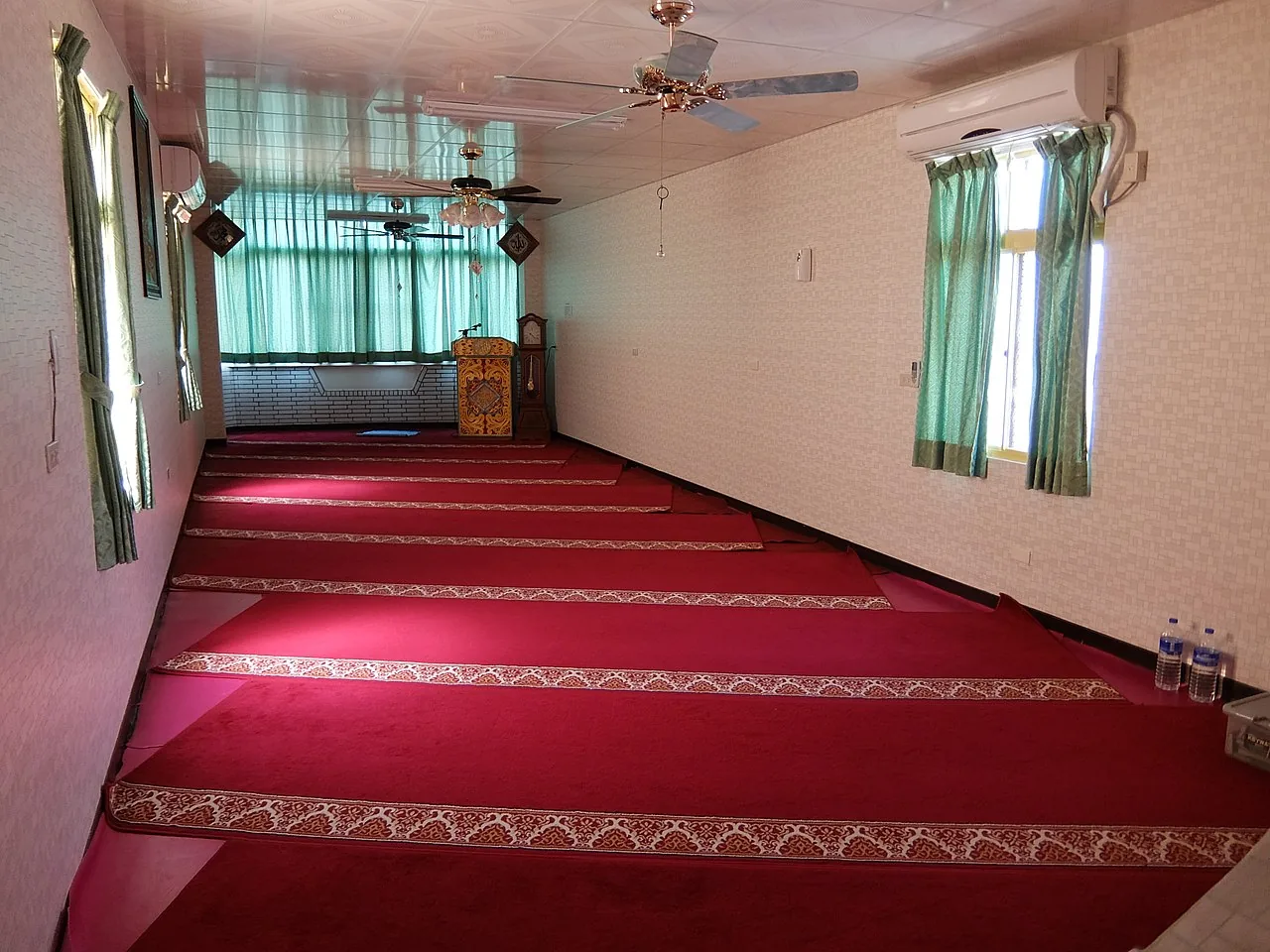 The interior of a mosque with prayer hall, serving Muslim travellers and the local Cham community in Da Nang The interior of a mosque with prayer hall, serving Muslim travellers and the local Cham community in Da Nang