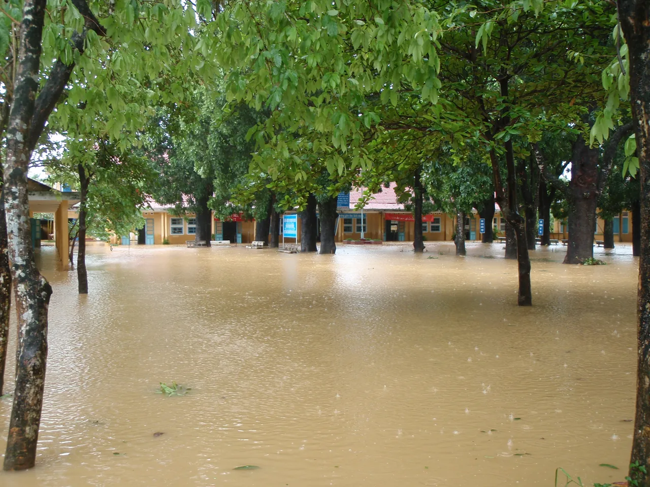 Floodwater submerging a courtyard and houses in central Vietnam during a typhoon