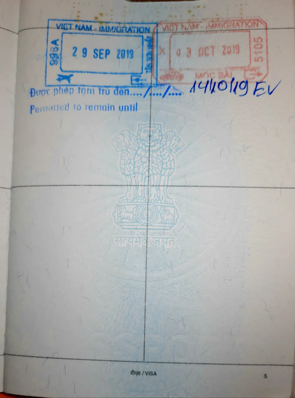 Vietnam immigration entry and exit stamps in a passport