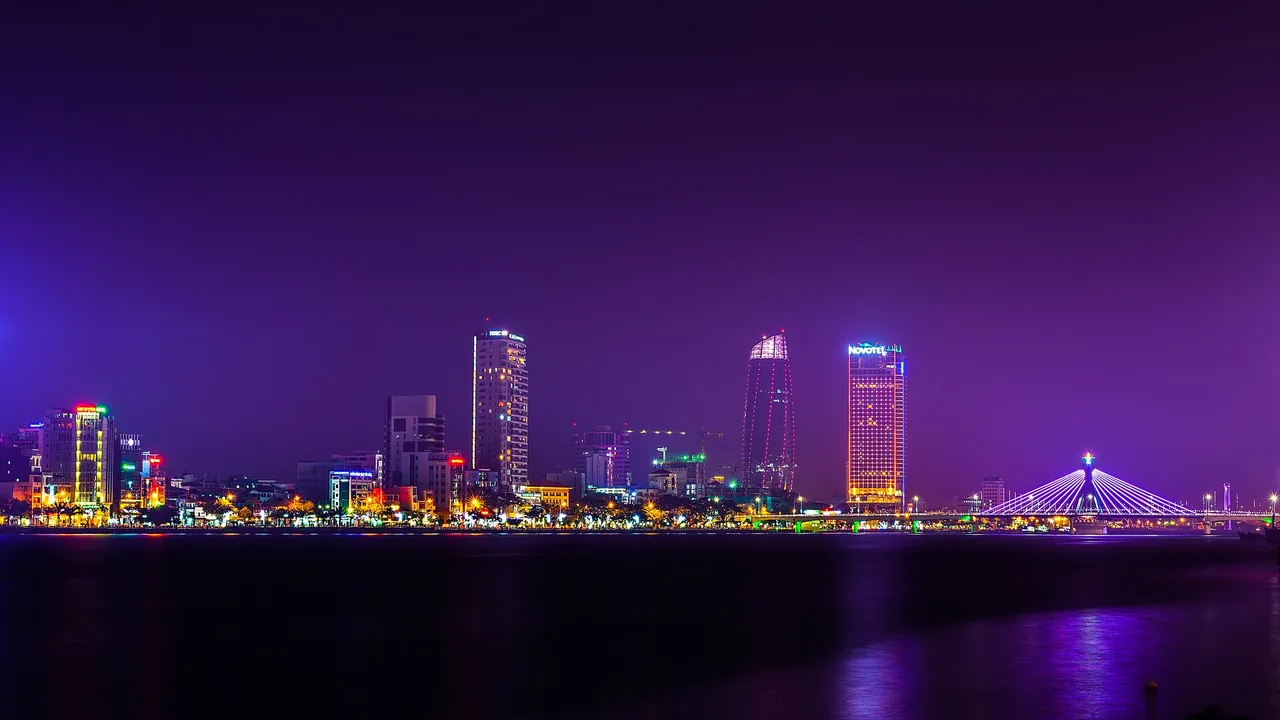 Da Nang skyline lit up at night along the Han River