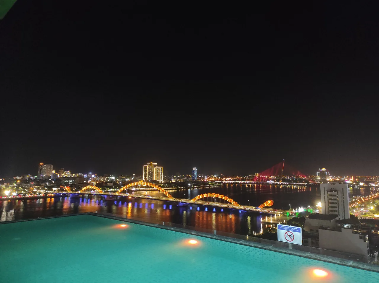 The Dragon Bridge in Da Nang lit up in colour at night The Dragon Bridge in Da Nang lit up in colour at night