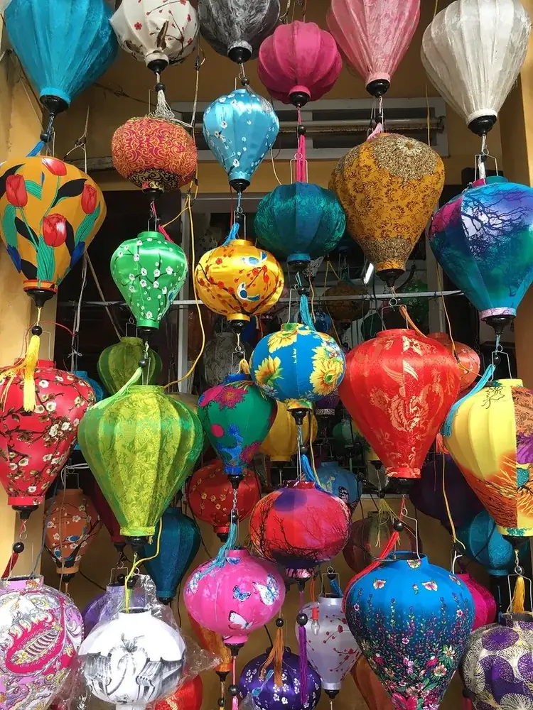 Glowing silk lanterns lighting up Hoi An Ancient Town at night