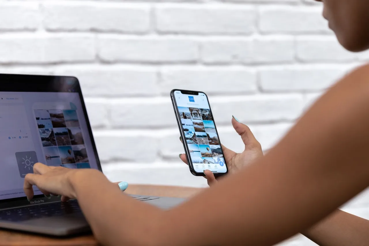 Comparing hotel options on a laptop and a phone