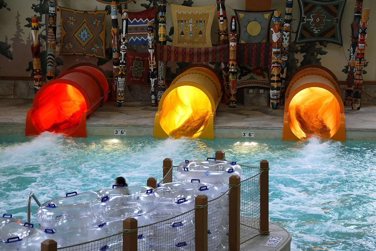 A large indoor water park hall with pools and slides, illustrating Mikazuki Water Park 365 in Da Nang