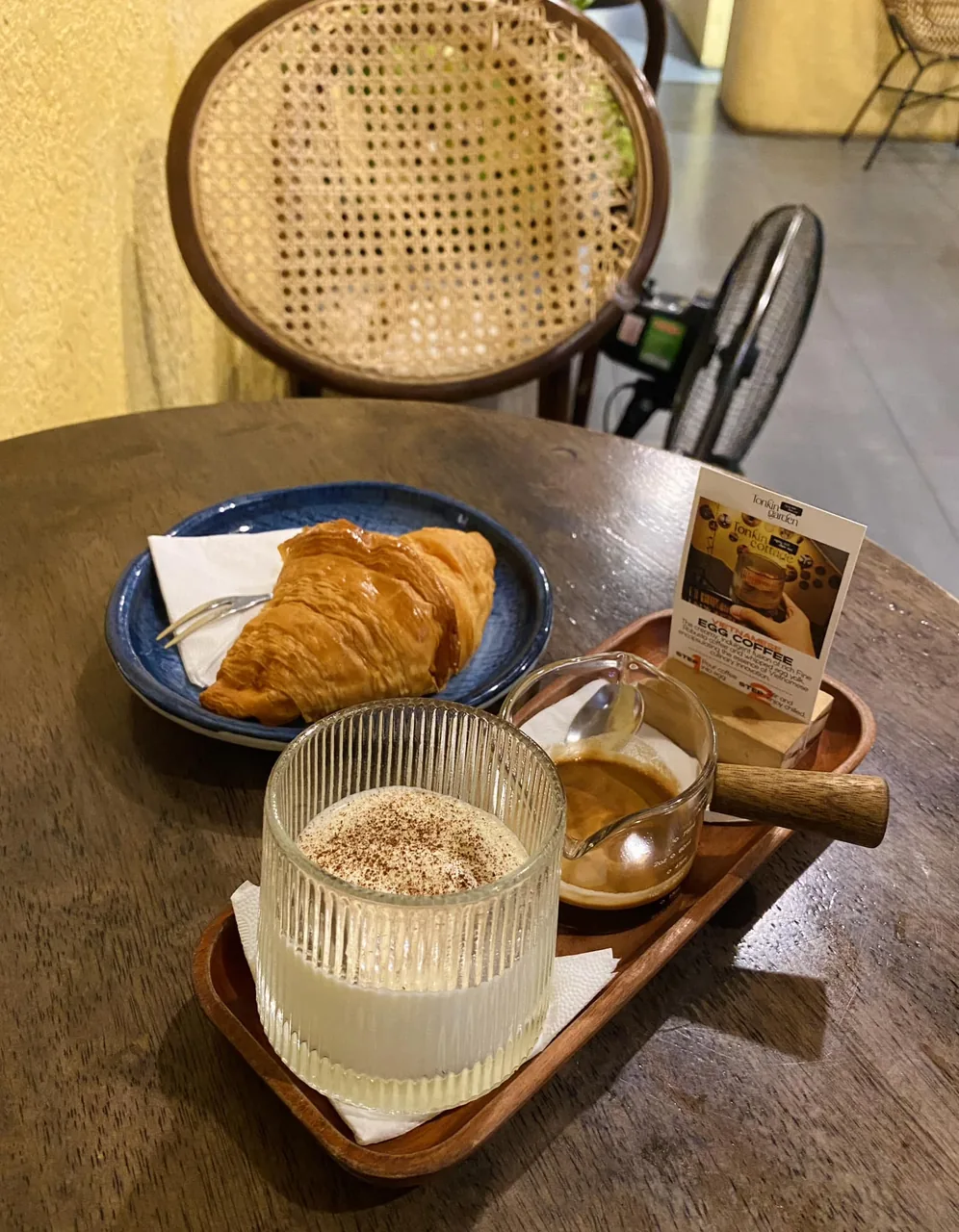 A cup of Vietnamese egg coffee with a creamy whipped top