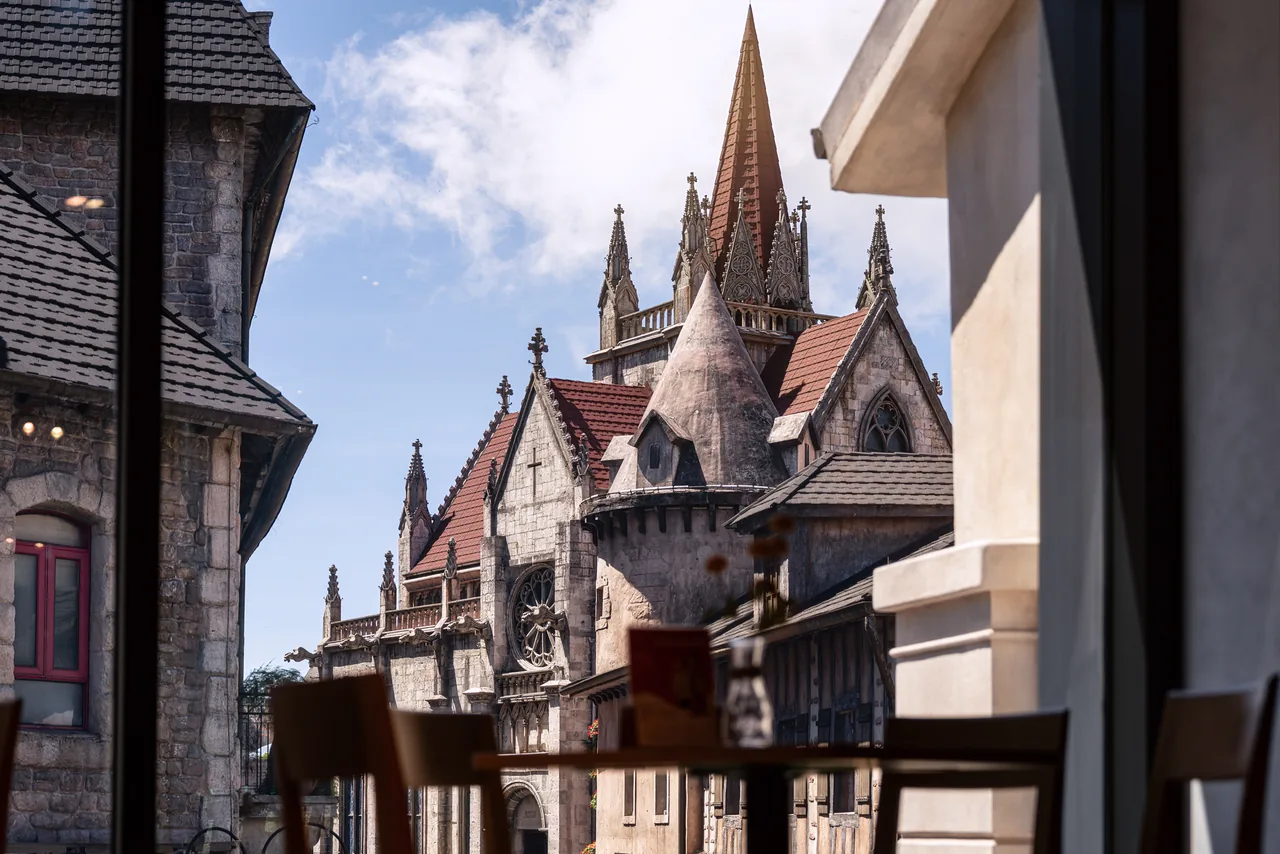 A cobbled street and cathedral spires in the French Village at Ba Na Hills