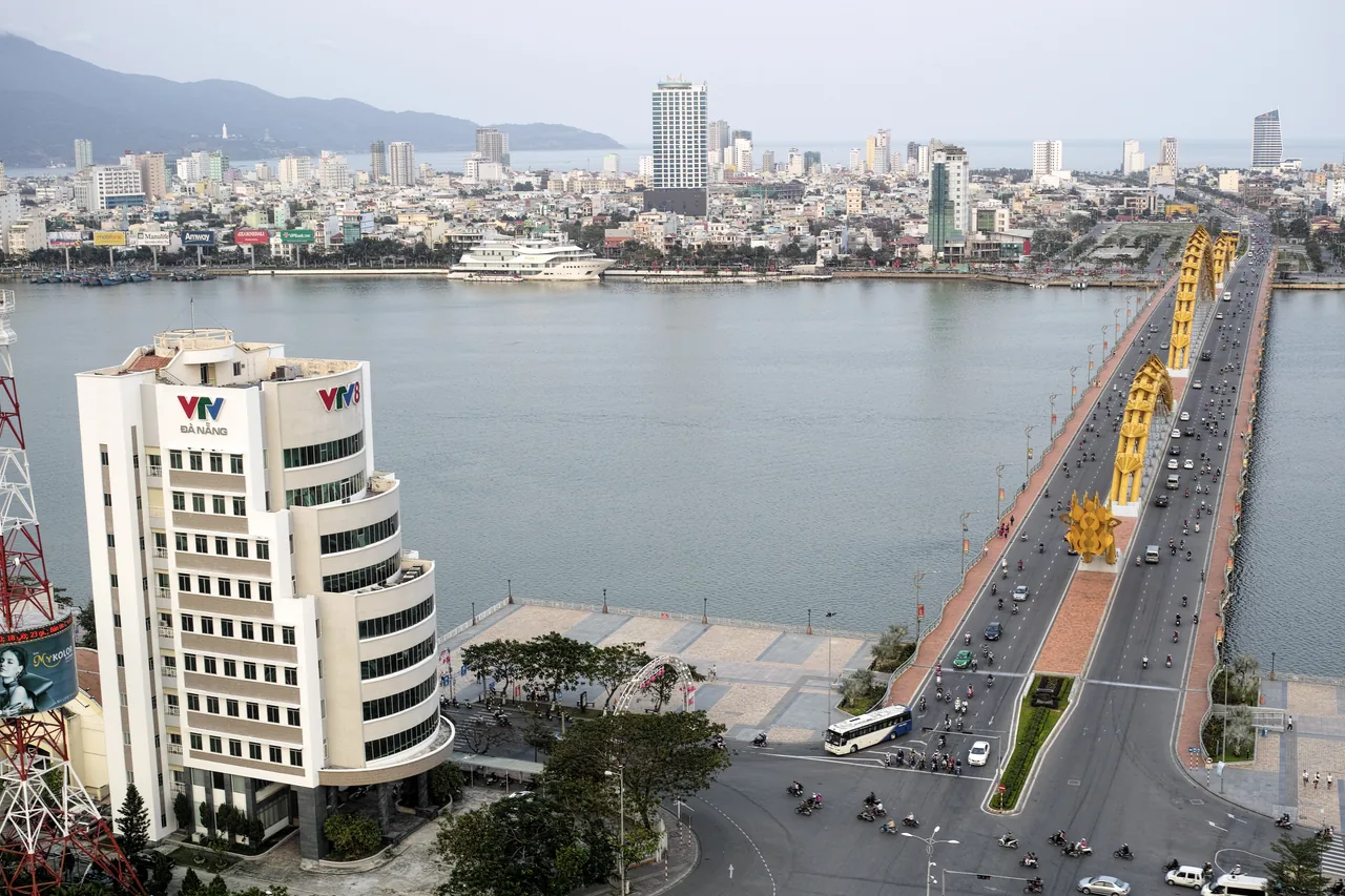The Dragon Bridge over the Han River in Da Nang lit up at night