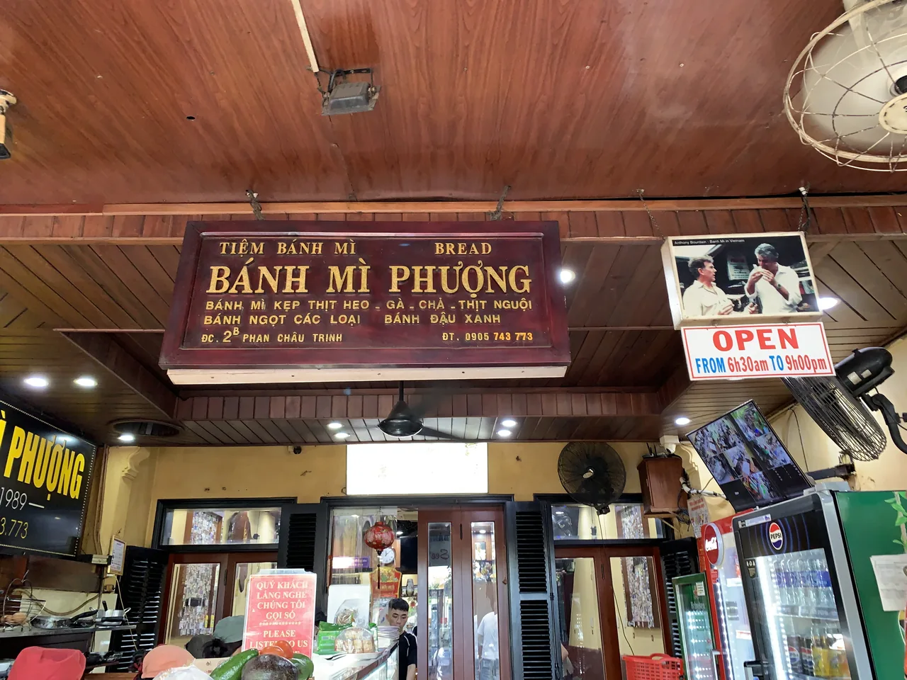 The famous Banh Mi Phuong shop sign and storefront in Hoi An