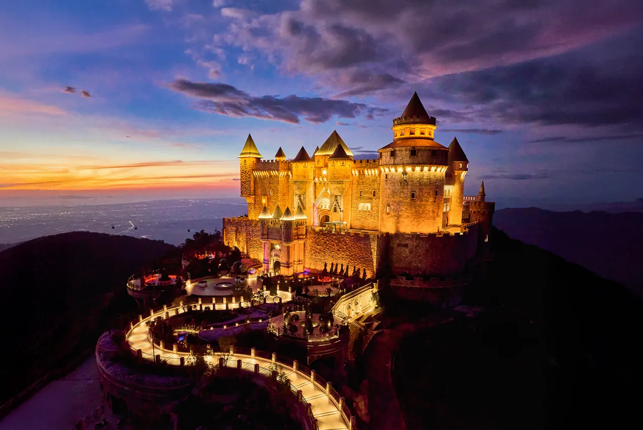 Lunar Castle illuminated at dusk in the Moon Kingdom zone of Ba Na Hills