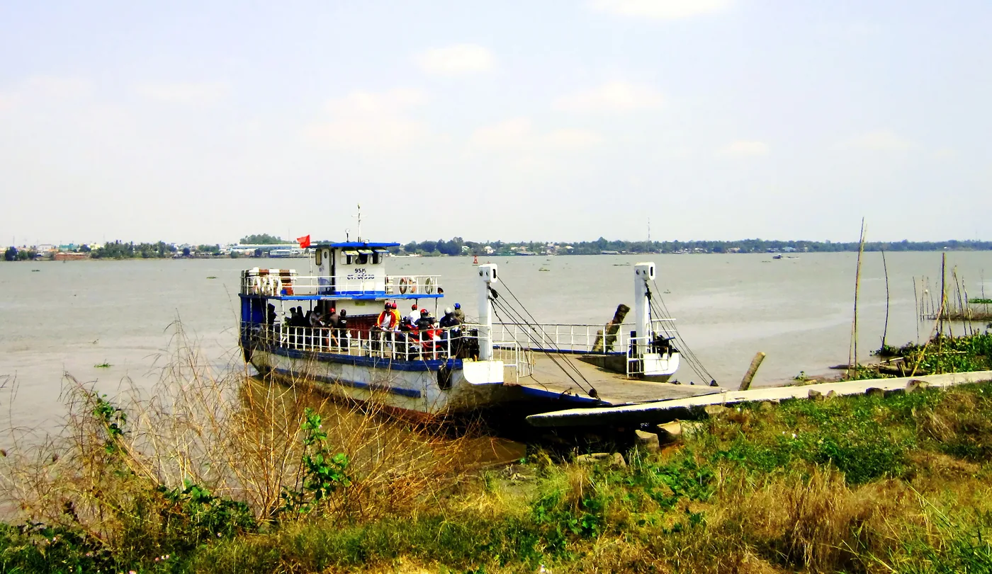 A Mekong Delta vehicle ferry loading at a river landing in southern Vietnam