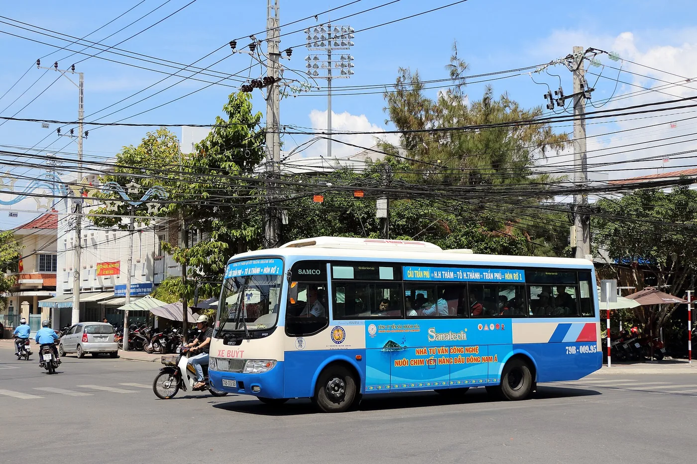 A public city bus on the street in Nha Trang, Vietnam A public city bus on the street in Nha Trang, Vietnam