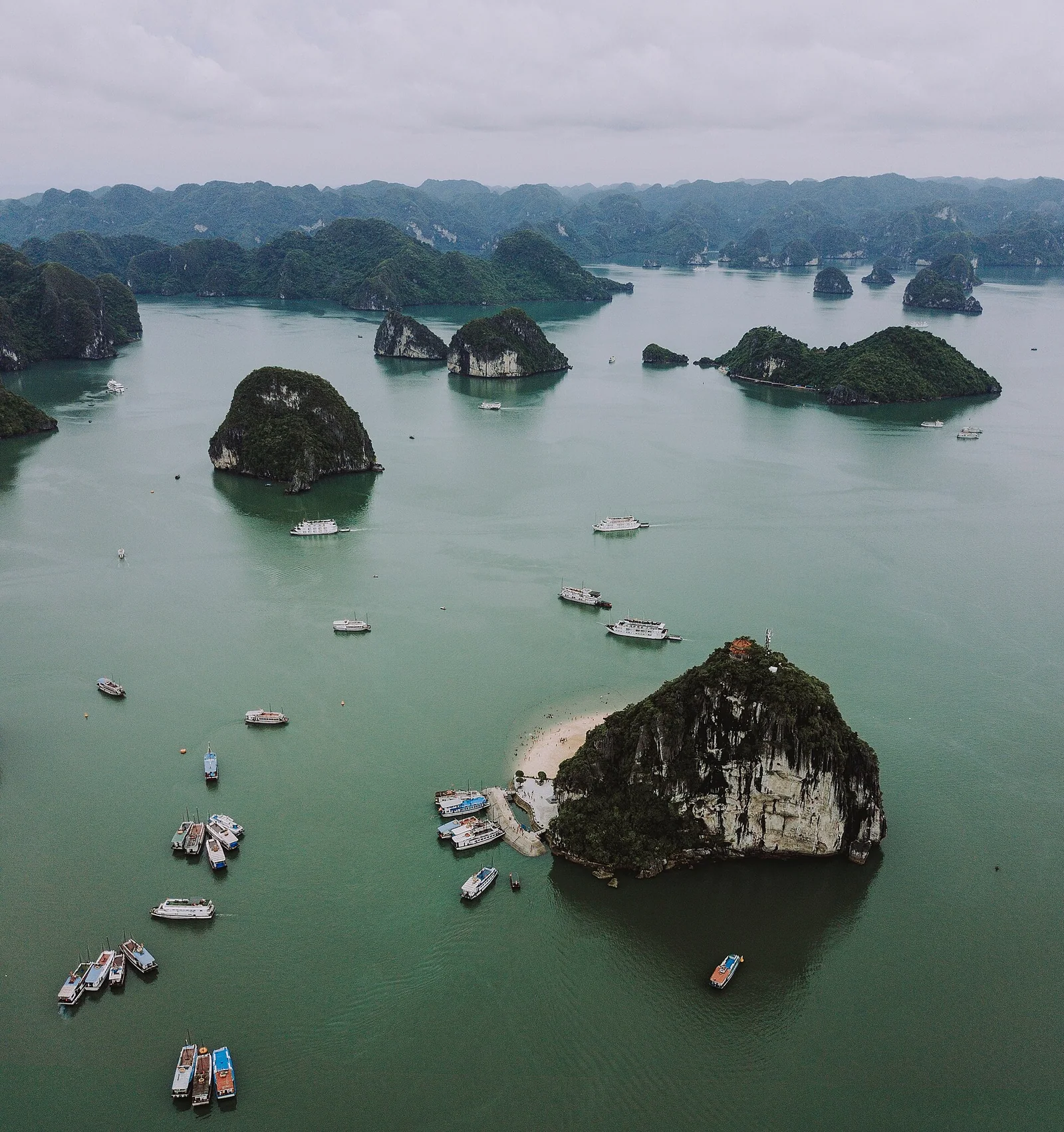 View over Ha Long Bay and moored boats from the viewpoint at the top of Ti Top Island
