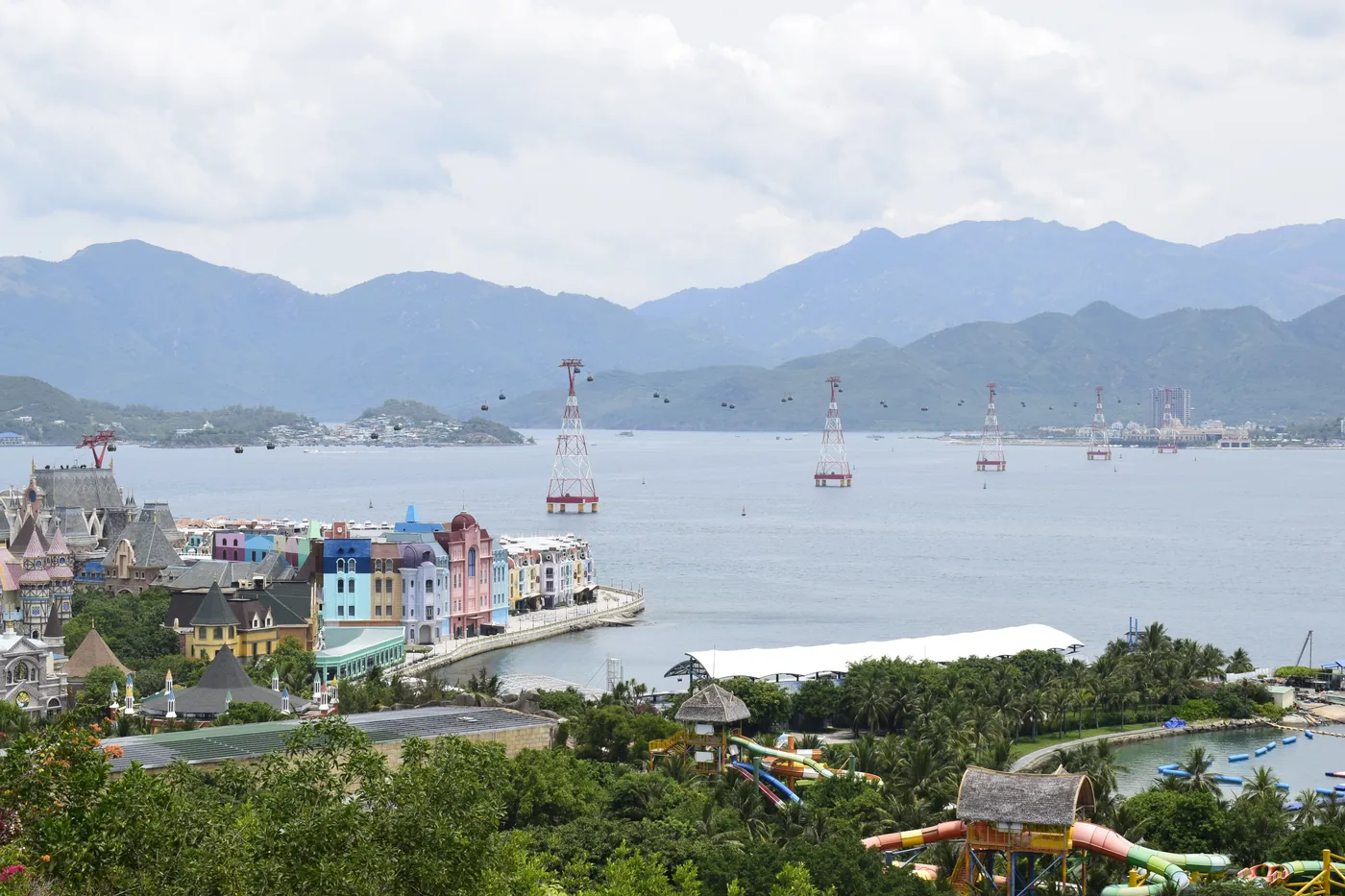 VinWonders theme park on Hon Tre island with the over-sea cable car towers crossing Nha Trang Bay, Vietnam
