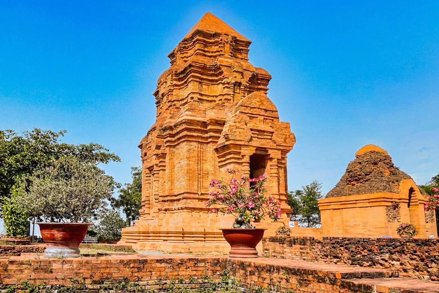 The brick Cham towers of Po Sah Inu on the hill above Phan Thiet The brick Cham towers of Po Sah Inu on the hill above Phan Thiet